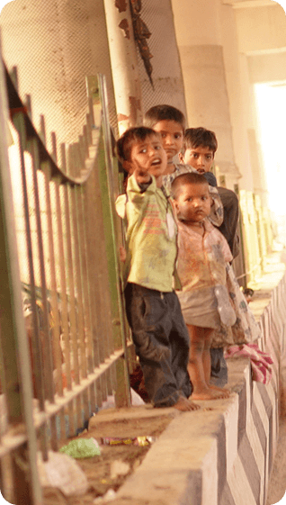 Child behind gate